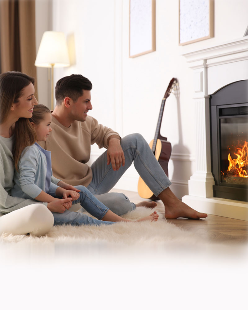 famille devant un foyer au gaz / efficacité énergétique